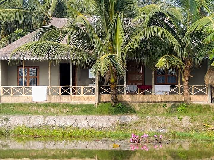 Earthen cottages with pond view